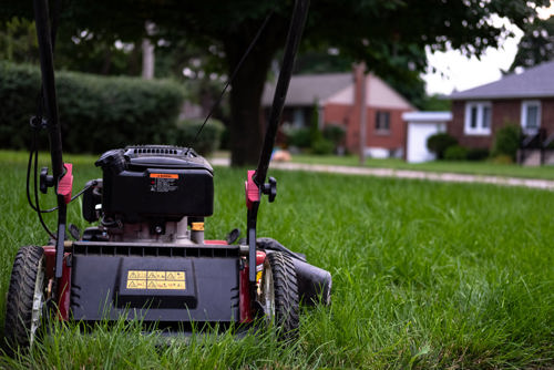 lawn-mower-sitting-on-grass.jpg